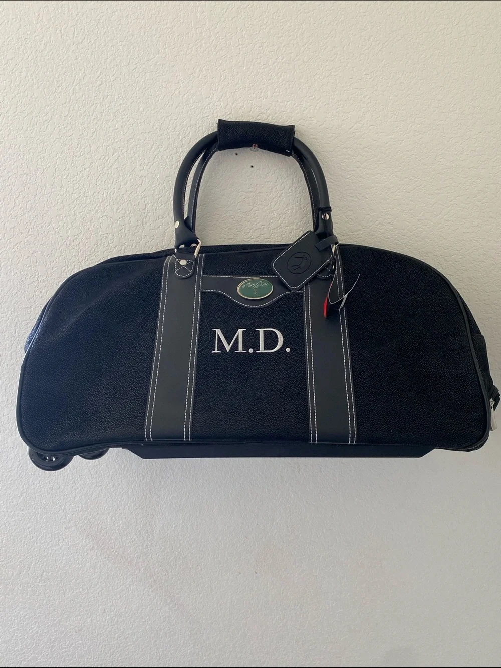 Sovrano Black  Novohyde Leather Wheeled Duffel Bag with Hideaway Handle NWOT